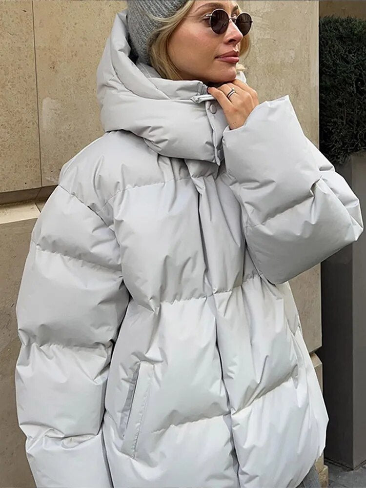 Women’s Winter Oversized Jacket With Hood And Long Sleeves