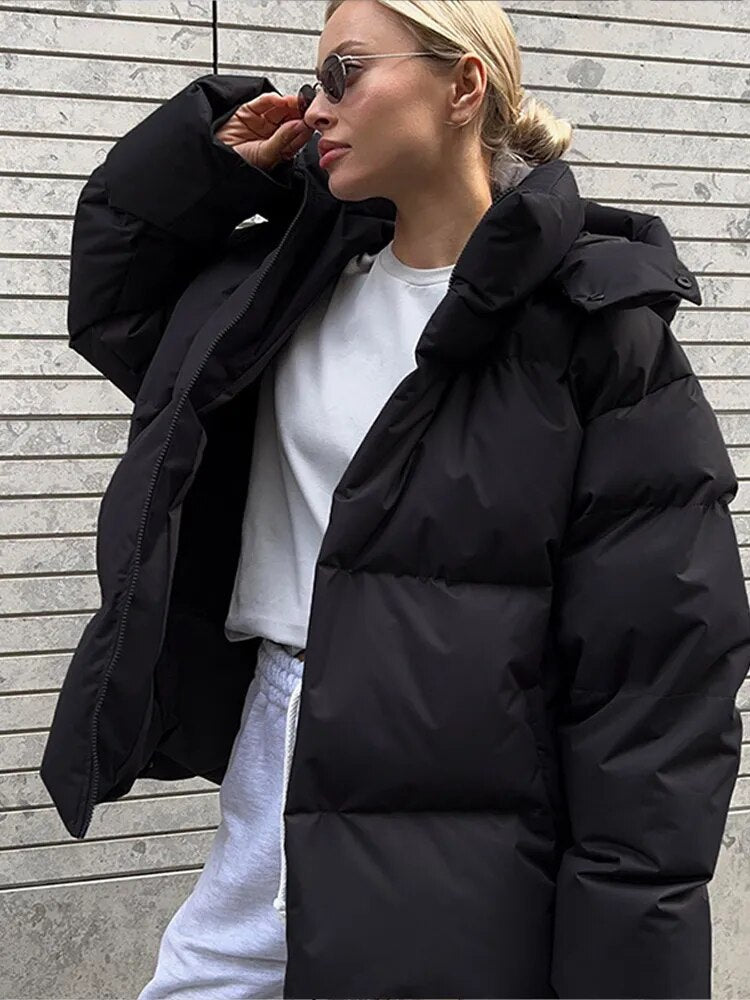 Women’s Winter Oversized Jacket With Hood And Long Sleeves