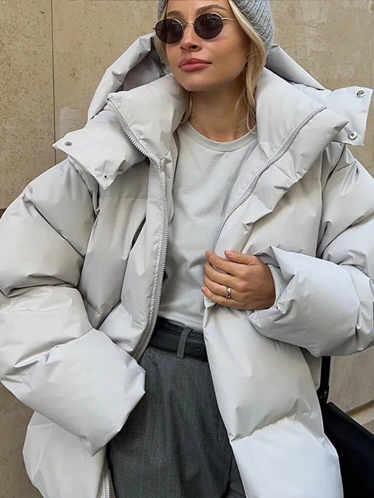 Women’s Winter Oversized Jacket With Hood And Long Sleeves